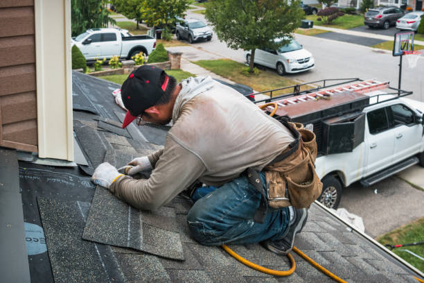 Professional Roof Replacement technician working in Utica, SD
